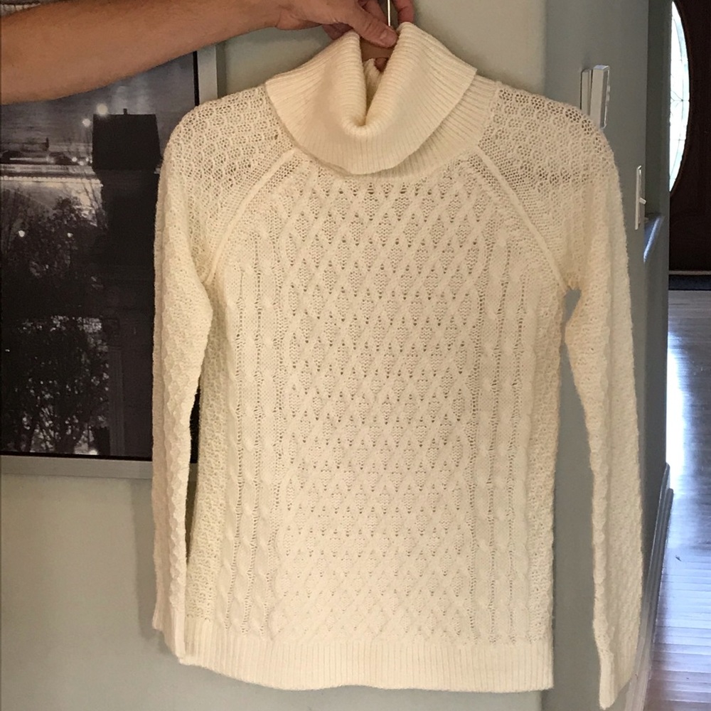 Fisherman style turtleneck sweater.  Like new!